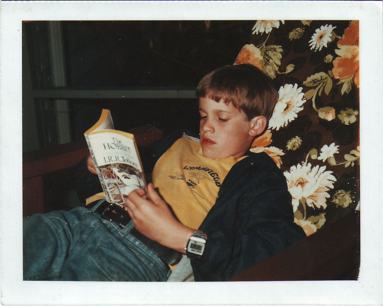 The author, at about age 11, reading The Hobbit