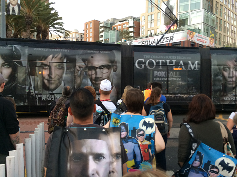 Gotham, advertised on side of train.